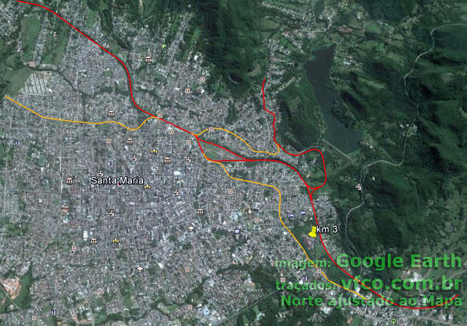 Traçados ferroviários antigos (laranja) e atuais (vermelho) na área urbana de Santa Maria, em uma imagem de satélite do Google Earth